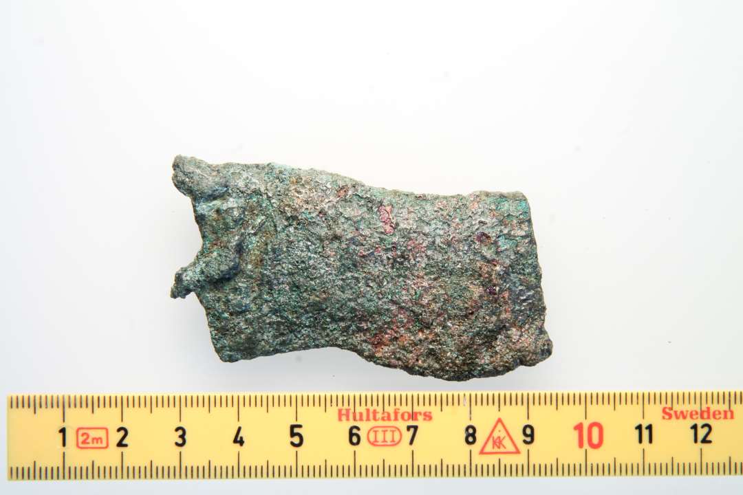Fragment af malmgryde (6,4x2,9 cm).