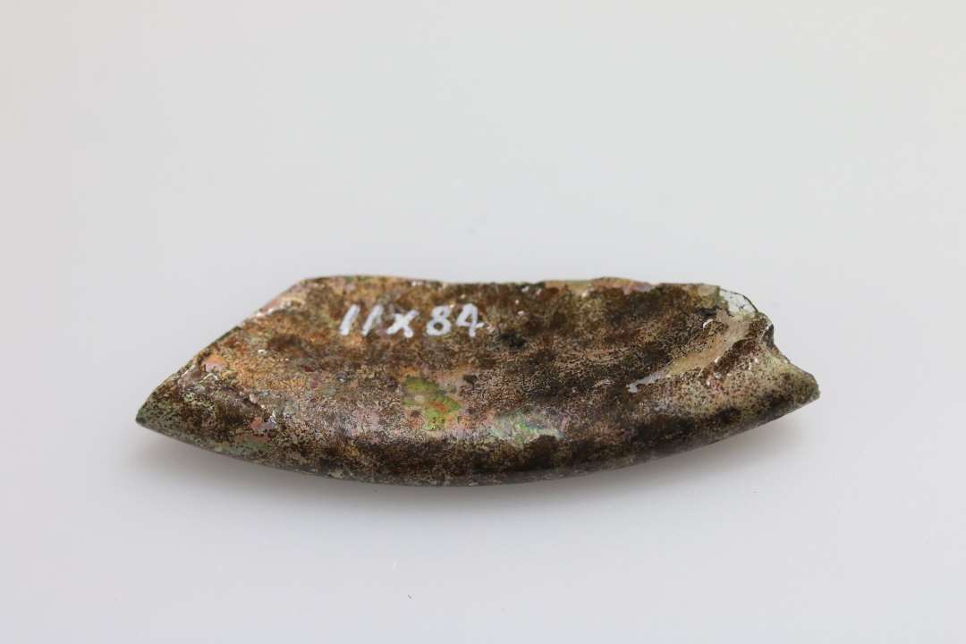 Foldet, opstukket fod fra drikkeglas. 1600-tal. Mål: ca 5,2 cm.