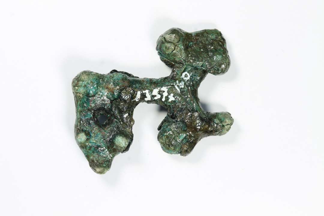Fragmenteret bronzenøgle, evt. fejlstøbning, eller delvist omsmeltet.
