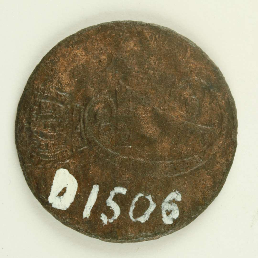 Kobbermønt, på den ene side 'C7' sammenslynget under krone og på den anden side indskriften: '½ SKILLING/DANSKE/ K.M./1771'.