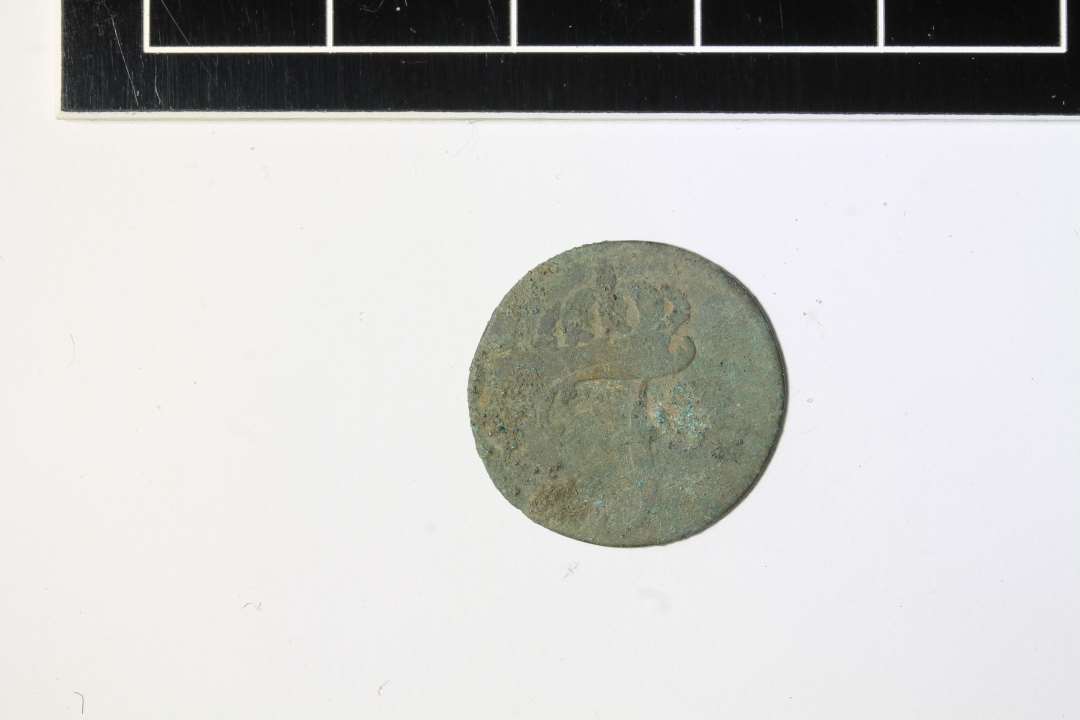 Mønt med kronet F og på bagsiden flere linier tekst, antagelig skilling fra o. 1800, ø 17 mm. Formentlig 1 Schilling Courant, Mecklenburg Schwerin, slut 1700-tal